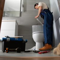 male-plumber-working-fix-problems-client-s-house_23-2150990702